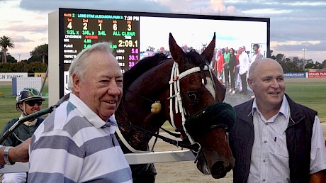 Lincoln Farms’ owner John Street, left, with one of his partners Phil Kelly pose with Lincoln Lou.
