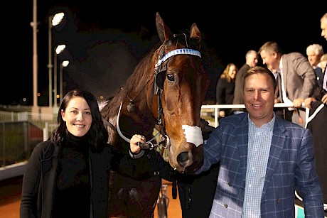 Hayden and Amanda Cullen with Bettor Twist after she ran down La Rosa to win the NZ Oaks at her last start. PHOTO: Addington Raceway.