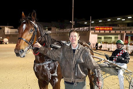 Trainer Paul Nairn with Outamyway and Blair Orange after their win in the Harness Million Trot on May 21. PHOTO: Addington Raceway.