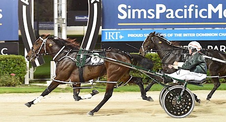 Simply Sam rushes past Mr Chip to score a stunning win at Alexandra Park tonight. PHOTO: Megan Liefting/Race Images.