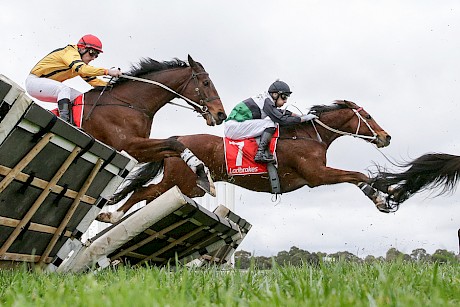 Aaron Kuru on his way to winning the Grand National last year on San Remo. PHOTO: Racing Photos.