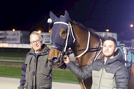 Ray Green and stable worker Nathan Delany with The Big Lebowski after his win. PHOTO: Ajay Berry/Race Images.