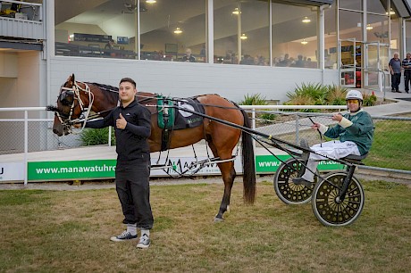 It’s thumbs up from driver Peter Ferguson and co-trainer Nate Delany. PHOTO: Jack McKenzie/Race Images.