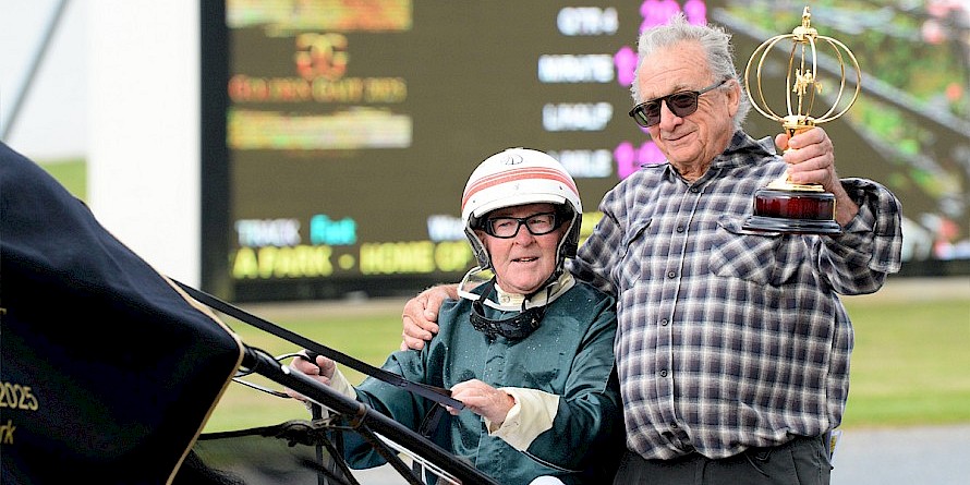 Ray Green holds the Golden Trophy after Tyson’s last, and biggest, win at Auckland. PHOTO: Therese Davis/Race Images.