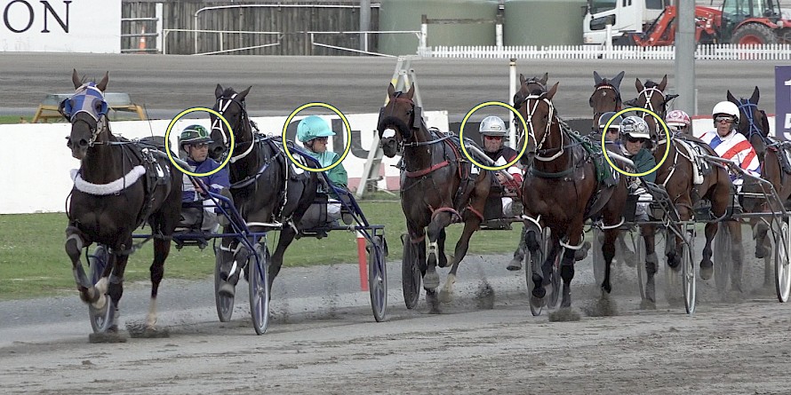 Drivers look around to see what caused the loud bang when Lincoln Wave’s sulky tyre punctured.